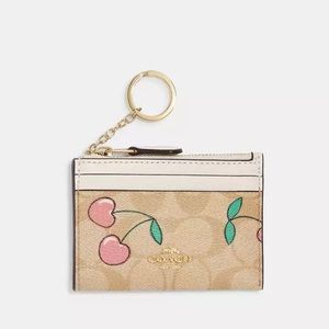 Mini Skinny Id Case In Signature Canvas With Heart Cherry Print